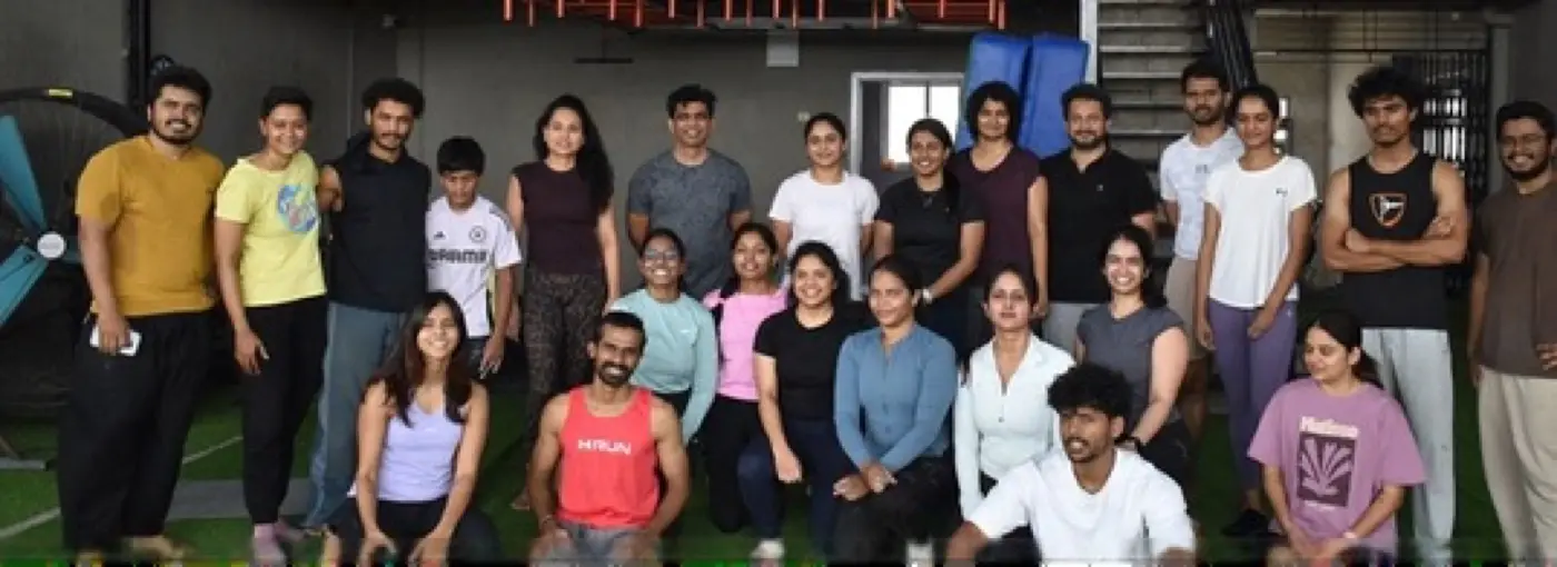 Large group photo of Calisthenics Lab India members at the gym